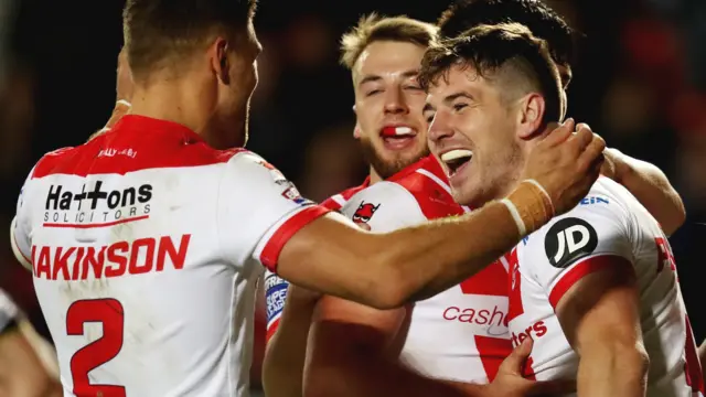 St Helens celebrate a try