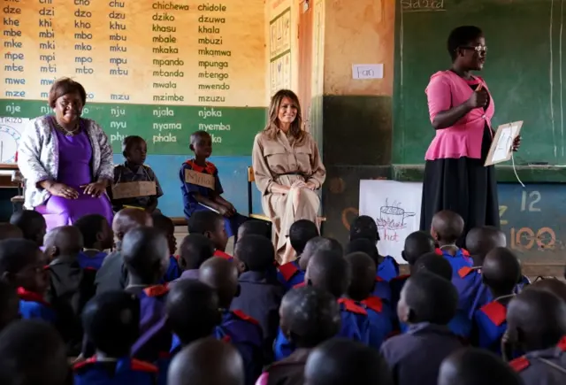 U.S. first lady Melania Trump looks on as she visits a school in Lilongwe, Malawi, October 4, 2018.