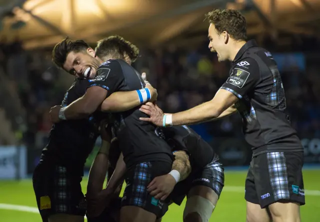 Glasgow celebrate Huw Jones' try