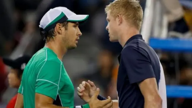 Kyle Edmund and Dusan Lajovic shaking hands after match