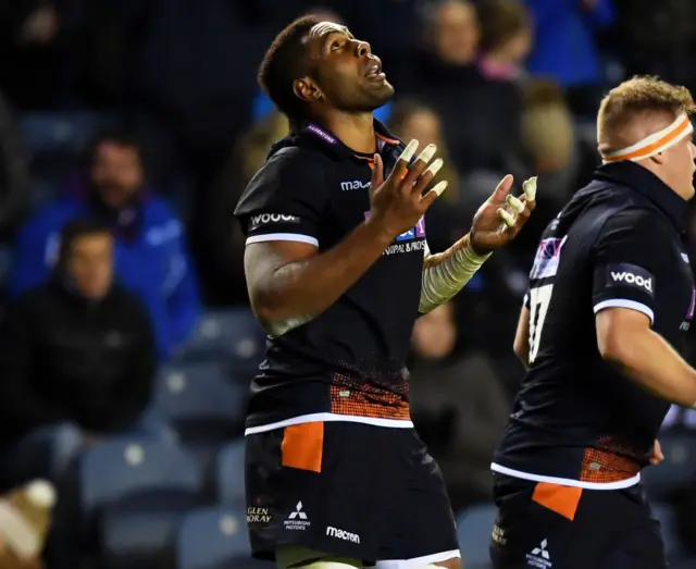 Edinburgh's Bill Mata celebrates his try