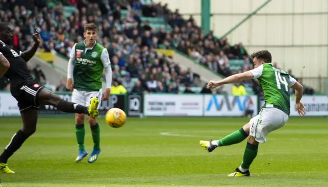 Stevie Mallan scores