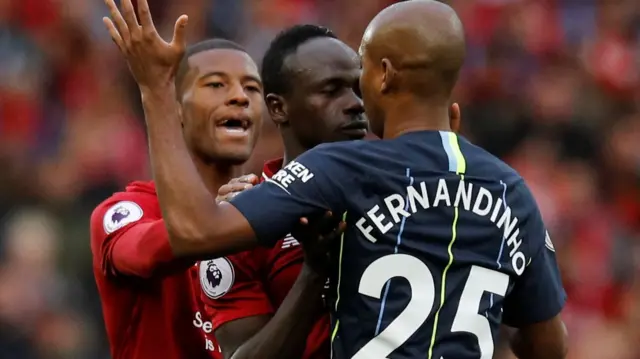 Fernandinho and Sadio Mane