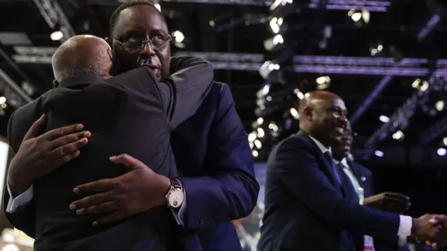 Macky Sall and Senegal government officials celebrate their country's selection as Youth Olympic hosts in 2022