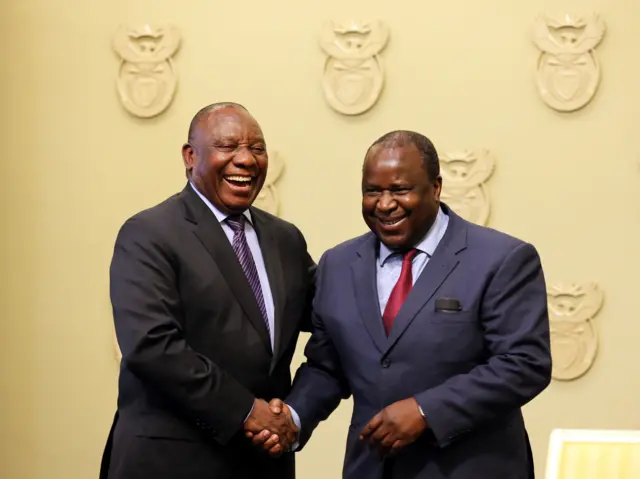 South Africa"s President Cyril Ramaphosa congratulates newly appointed Finance Minister Tito Mboweni in Cape Town, South Africa, October 9, 2018.