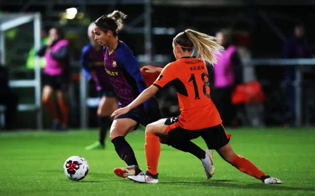 Natasha Andonova of Barcelona vies with Samanth Kerr of Glasgow City