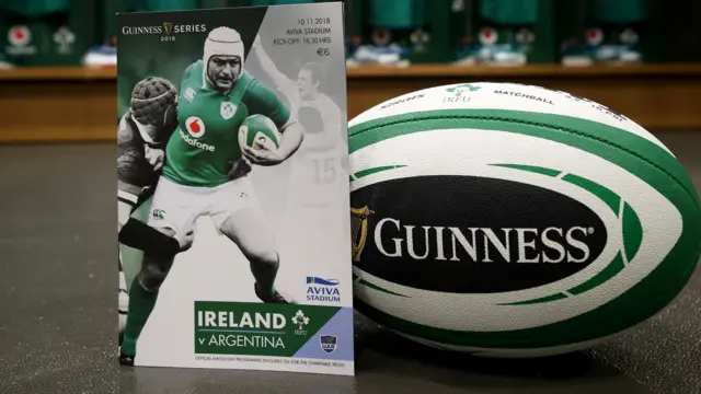 A view of a match programme and ball in the dressing room