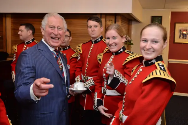The Prince of Wales, Colonel, Welsh Guards, sharing a joke with members of the Welsh Guards band