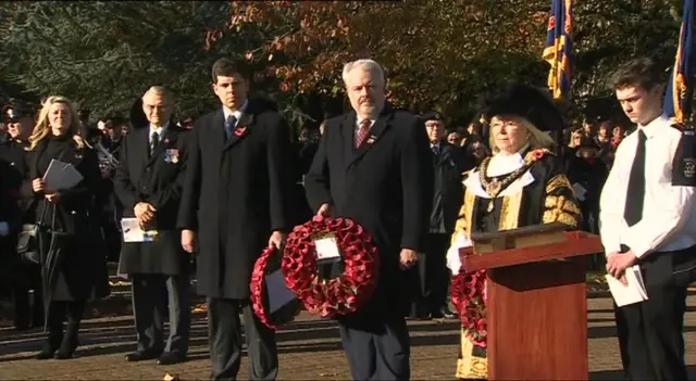 Wales First Minister Carwyn Jones lays wreath at national memorial