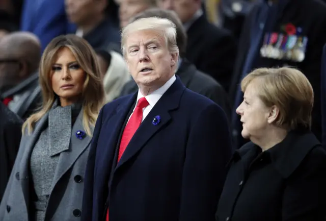 US president Donald Trump with wife Melania and German chancellor Angela Merkel