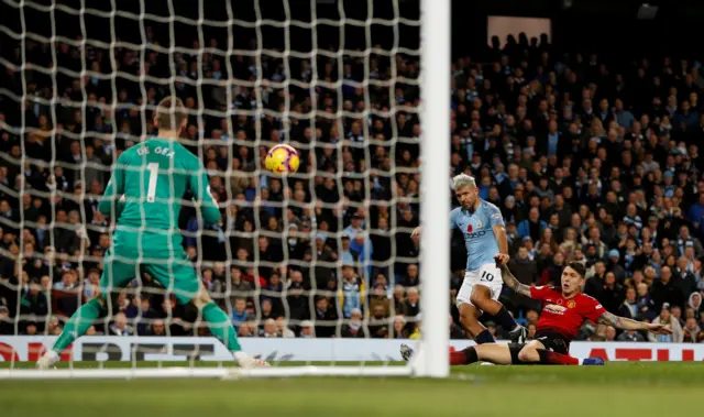 Sergio Aguero scores