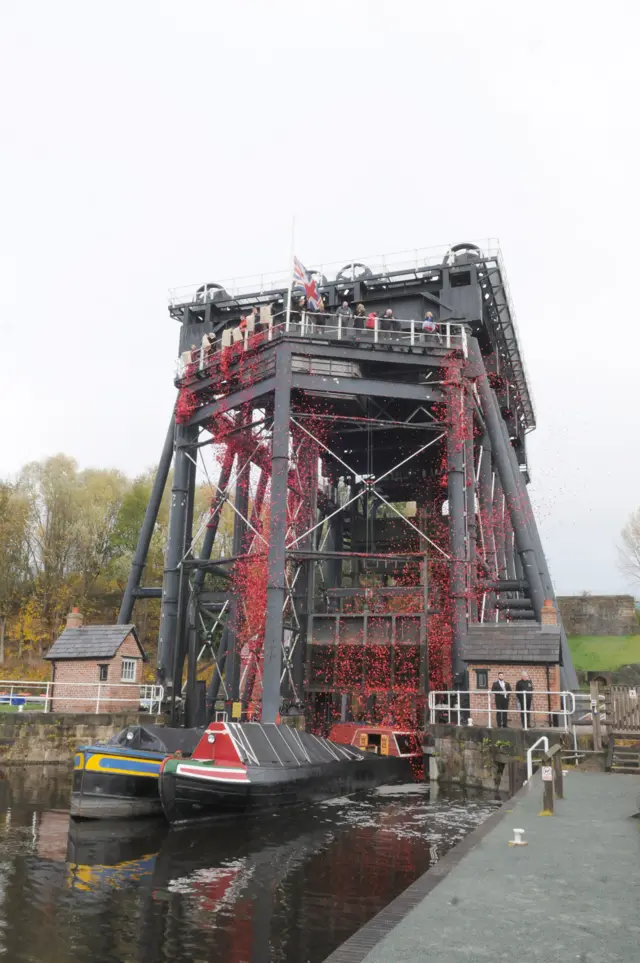 Poppies falling from Cheshire’s Anderton Boat Lift
