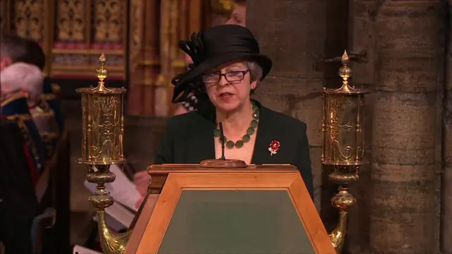 Theresa May reading at the Westminster Abbey service