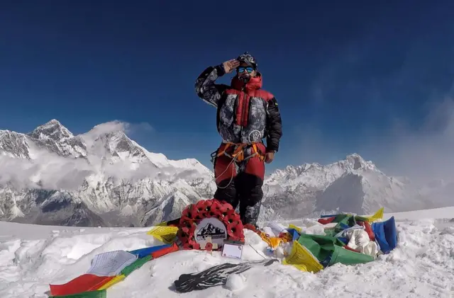 Nims Purja at the peak of Ama Dablam
