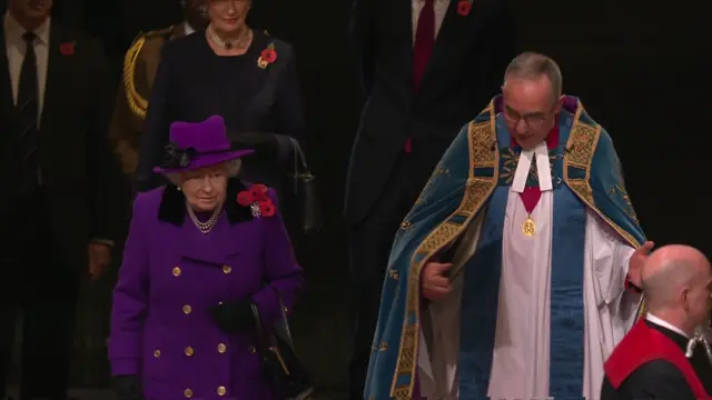 The Queen enters the abbey for the service