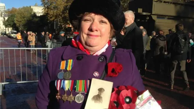 Emma Silk, grand-daughter of Harold Victor Silk, who lost his left arm in battle the day before Armistice Day