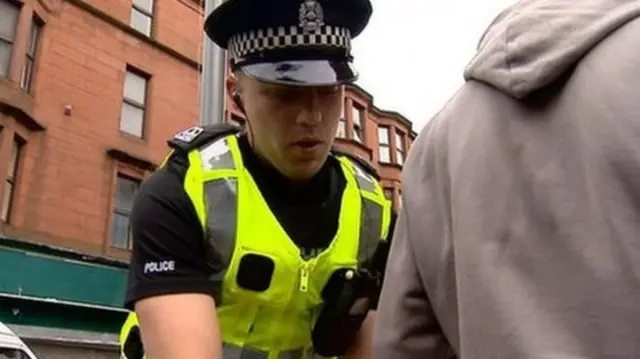 Young person being arrested