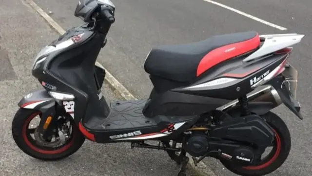 Black, red and white Sinnis Harrier moped