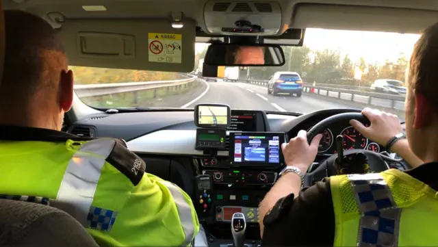 Two police officers in a car