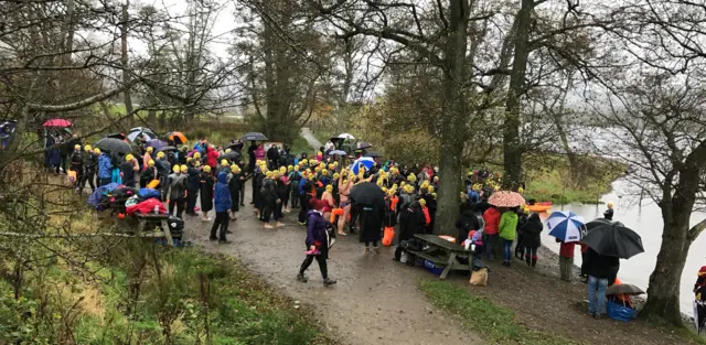 Crowd watching swimmers in Ullswater