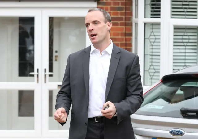 Dominic Raab, who resigned earlier in the day as Brexit Secretary, speaking outside his Surrey home.