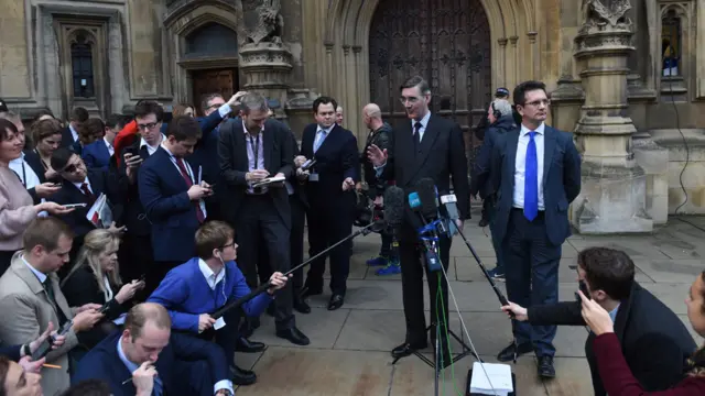 Leading Brexiteer Jacob Rees-Mogg tells the media outside the Palace of Westminster that he has sent a letter of no confidence in Mrs May