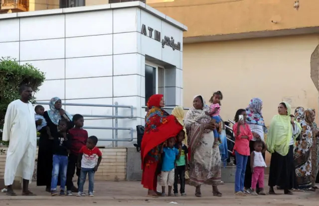 People queuing at an ATM in Khartoum, Sudan