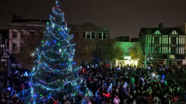 The Christmas tree lit up