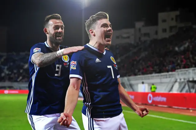 Scotland's Steven Fletcher and James Forrest celebrate