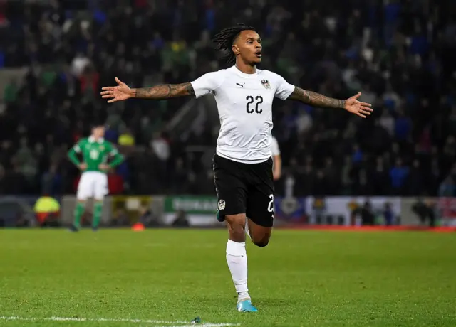 Valentino Lazaro celebrates