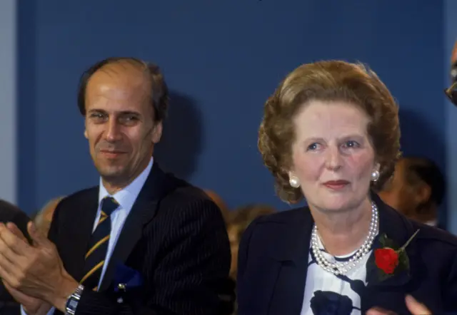 Norman Tebbit alongside Margaret Thatcher in 1986