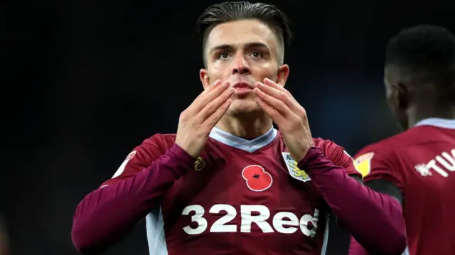 Grealish kiss