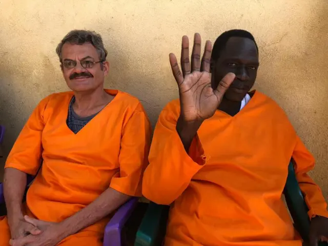 ormer army colonel William Endly and former SPLM-IO spokesman James Gatdet in Juba being handed over to the ICRC