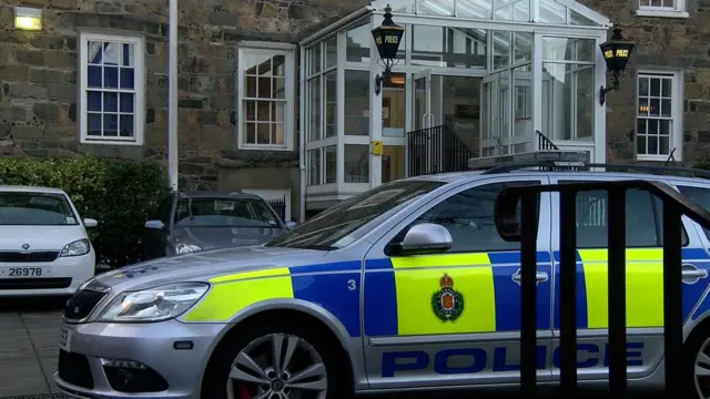 A police car outside Guernsey's Police Station