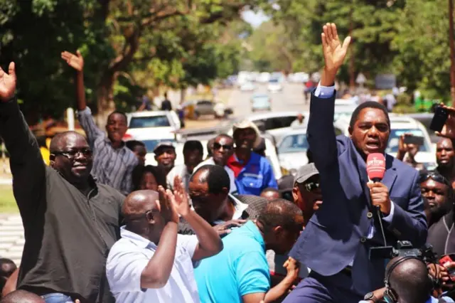 Hakainde Hichilema and his supporters