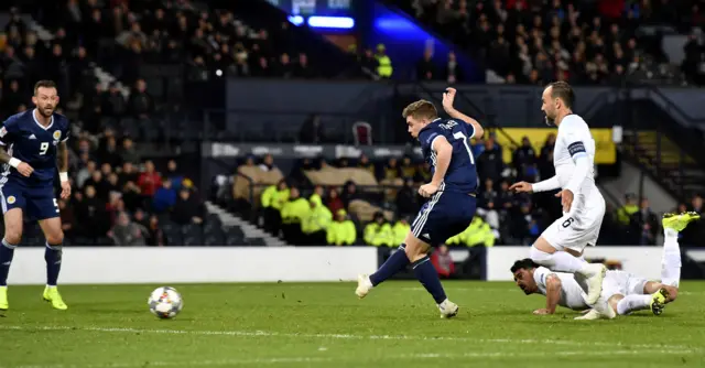 James Forrest rolls in his third goal of the night
