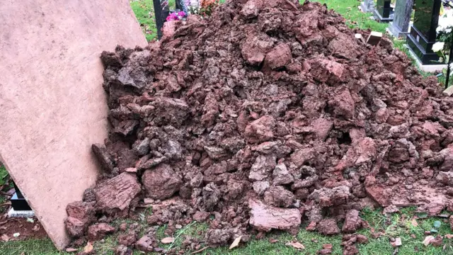 Daniel Hegarty's grave covered in soil