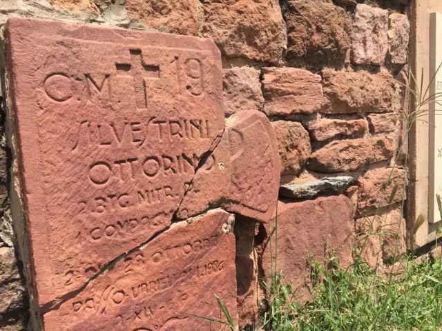 Broken gravestone