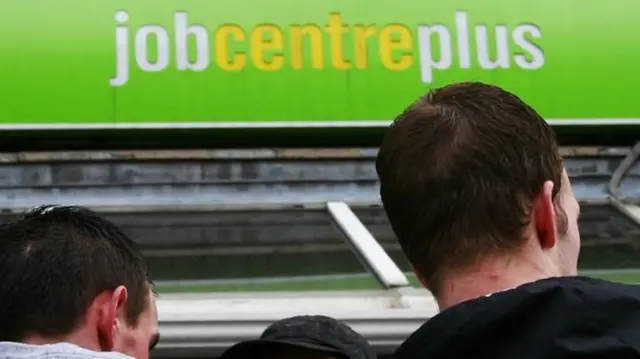 Men outside Job Centre