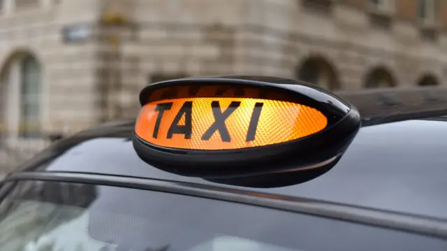 Black cab sign