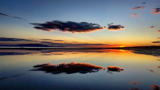 This perfect reflection was caught by Martin McKerrell, looking onto the island of Arran from Irvine beach.