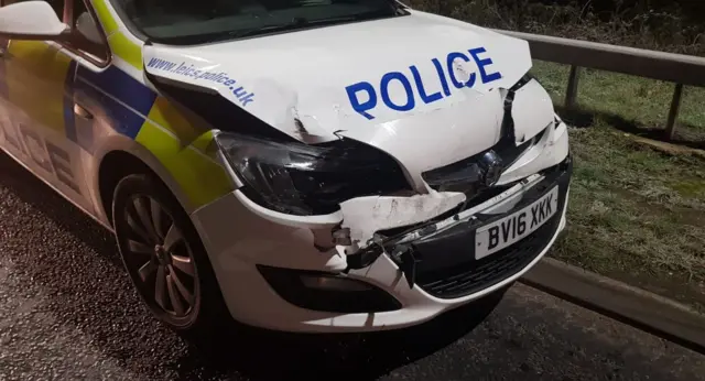 Damaged police car