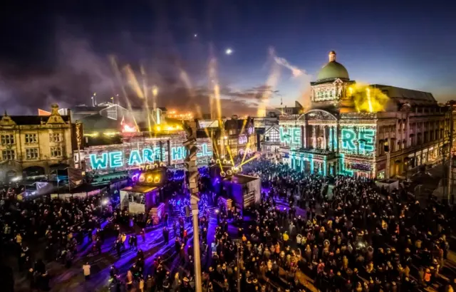 The words We Are Hull being projected onto buildings in the city"s Queen Victoria Square