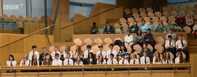 School pupils are listening to "exciting" debate on economic statistics