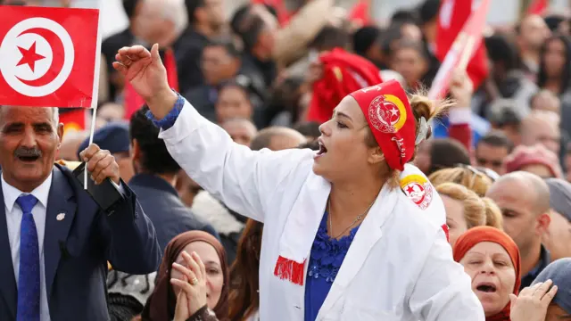 People attend a protest against the government"s refusal to raise wages in Tunis, Tunisia November 22, 2018.