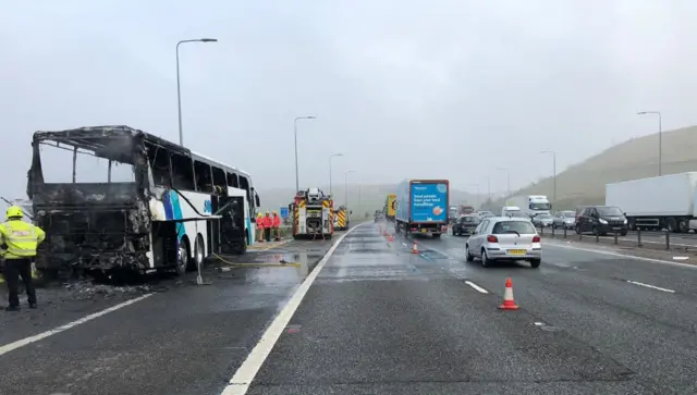 The burnt out coach on the M62 between J22 and J23.