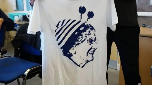 A close up of the T-shirt with Jean Bishop's face on it