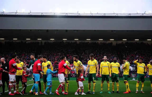 Bristol City and Norwich exchange handshakes pre-match