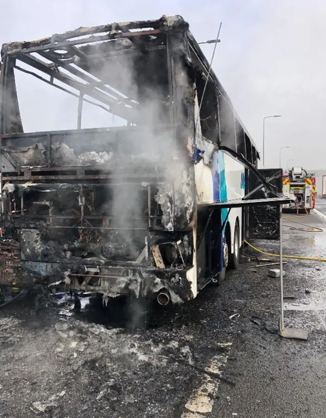 The burnt out coach on the M62 between J22 and J23.