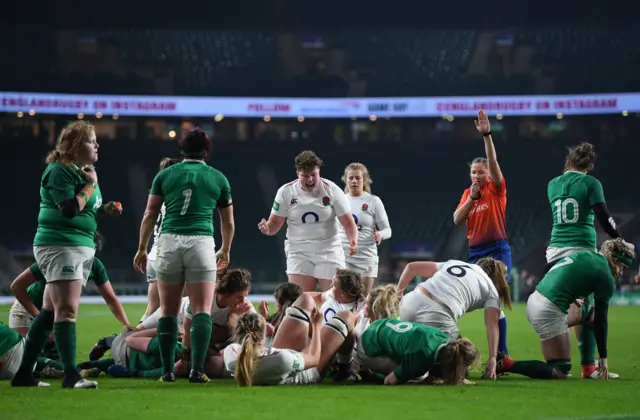 England celebrate their opening try against Ireland